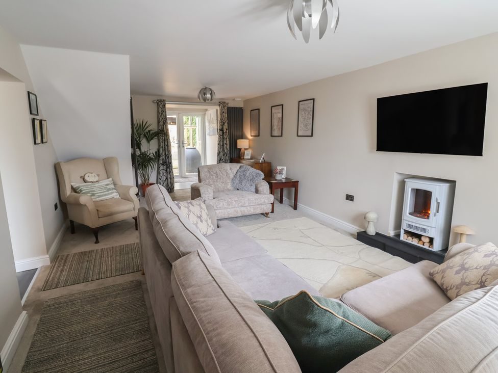 Living room with sofa and armchair
