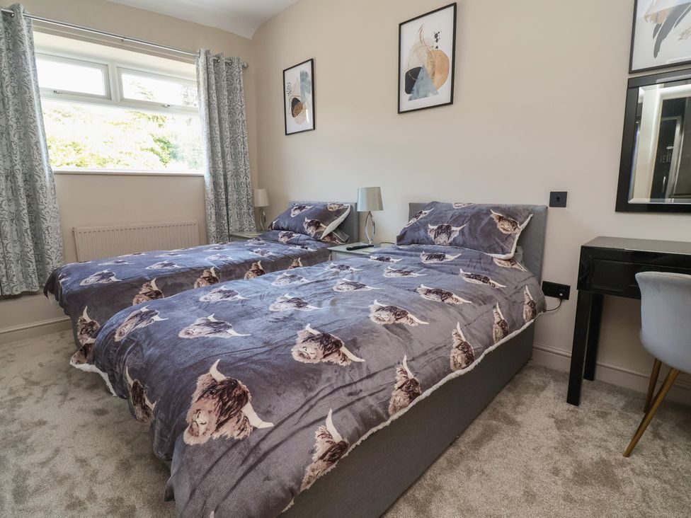 Twin bedroom with desk