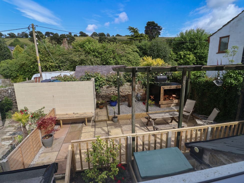 Courtyard with planting and views over the hills